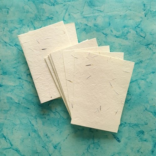Off White Plantable Marigold Seed Paper pack of - DEVRAAJ HANDMADE PAPER, PLANTABLE SEED PAPERS & PAPER PRODUCTS - 4
